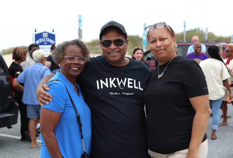Johnnie Walker Beach Day brought a big crowd to Lewes. Shown are (l-r) Janet Maull Martin, Darryl Daisey and Gina Mifflin.